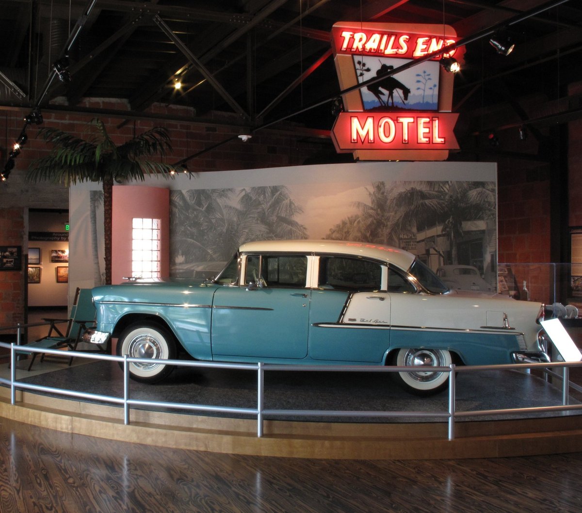 1955 Chevy with Trails End Motel neon sign inside the historic 1921 rail station